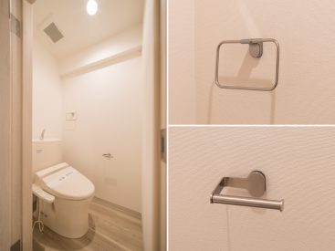 トイレ。タオル掛けやトイレットペーパーホルダーはシックなデザイン。