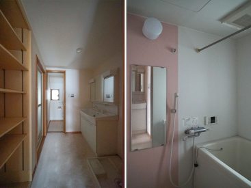 収納棚がうれしい洗面スペースとピンクな浴室