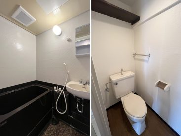 バスルームに洗面スペース。黒い浴槽が特徴的。トイレは温水付きのものではありませんのであしからず。