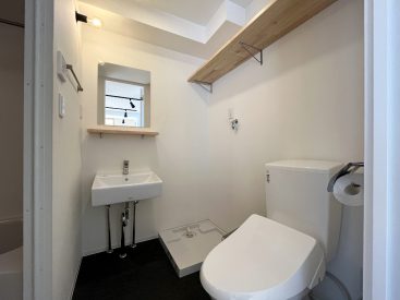 洗面、トイレ、洗濯機置き場がひとつになった脱衣所。