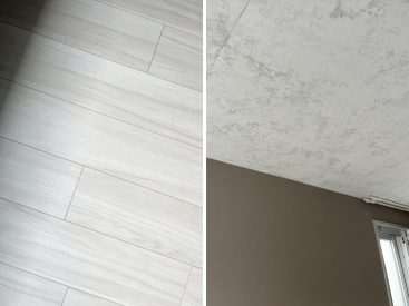 床はマットなフローリング。天井にも質感、ダークカラーのクロスに合います。