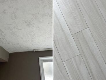 床はマットなフローリング。天井にも質感、ダークカラーのクロスに合います。