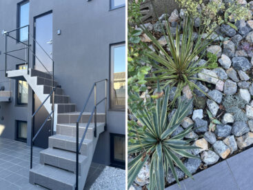 部屋前までは階段で。敷地内にはグリーンの植物も。